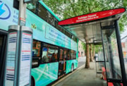 TfL Image - 3000th zero-emission bus alongside a bus shelter: TfL Image - 3000th zero-emission bus alongside a bus shelter