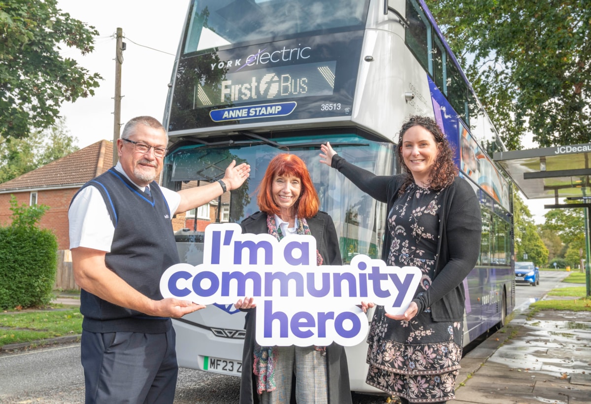 Anne Stamp (centre) with driver Neil Allatt and Jenny Bartlett from First Bus