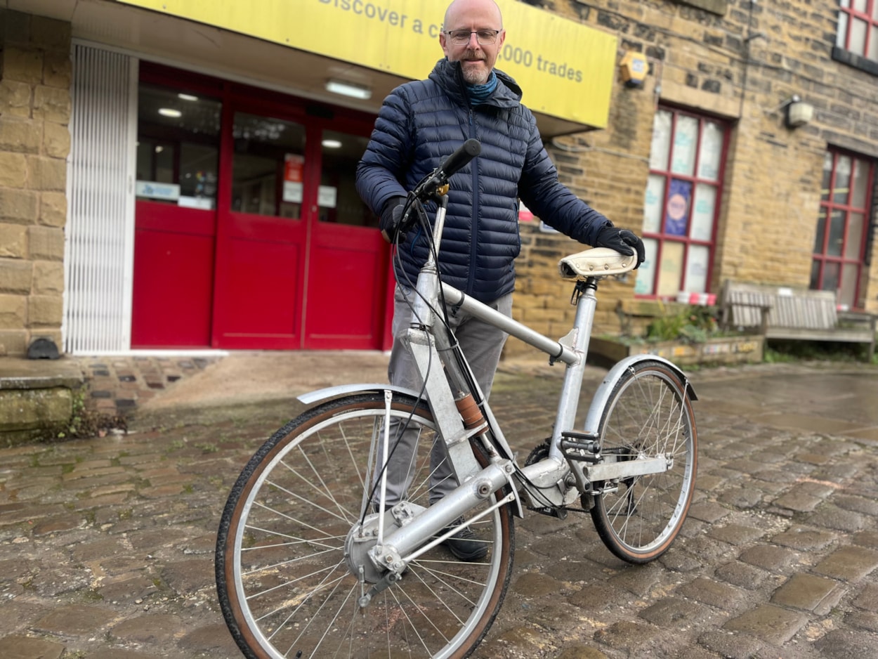 Fen Easy Rider: The hulking Fen Easy Rider bicycle was made in the late 1970s to tackle the rugged roads bordering parts of the British countryside, and gives a remarkable insight into the fascinating story of Leeds pioneer Henry Brown, who recently died at the age of 102.
This week his tenacious two-wheeler took on what may have been its biggest challenge yet, when it was road tested on the traditional Victorian cobbles outside Leeds Industrial Museum by curator John McGoldrick (pictured).