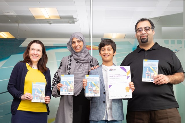 TfL Image - Ibraheem Saleemi (Winner 7-11) with his family and Chief Data Officer, Lauren Sager Weinstein