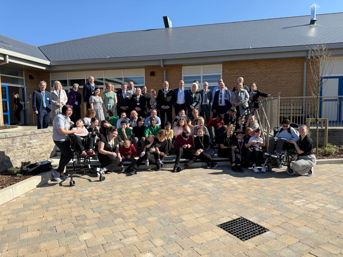 staff, pupils and councillors at the new pens meadow school