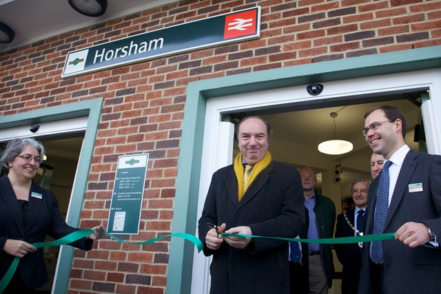 Rail minister Norman Baker MP officially opens NSIP improvements at Horsham station, watched by representatives of Southern Railway, Network Rail and West Sussex County Council.