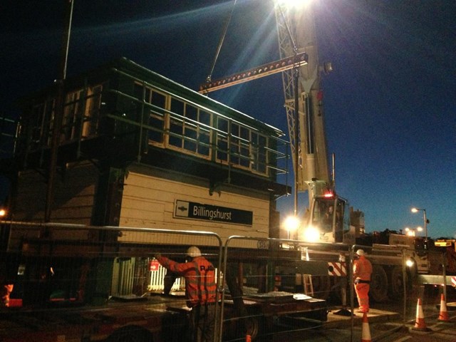 Billingshurst signal box is lifted onto the back of a low-loader