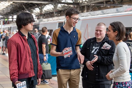 Avanti West Coast Dick Kerr Ladies Postcards 2: L-R: Jason, Harry and Matthew, interns from DFN Project SEARCH, hand out postcards at Preston station to raise awareness of the Dick, Kerr Ladies football team