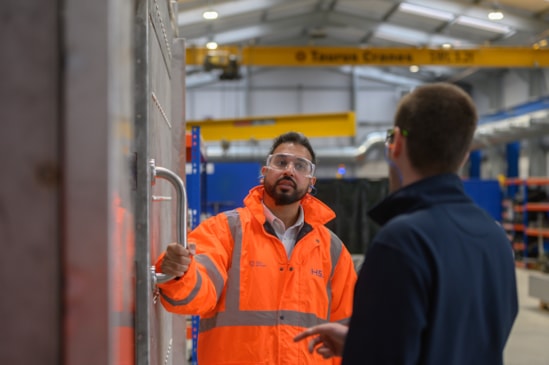 20260412 - HS2 Ltd Head of Rail Systems Delivery, Qasir Raza meeting Booth employees at  the cross-passage door factory in Bolton-2