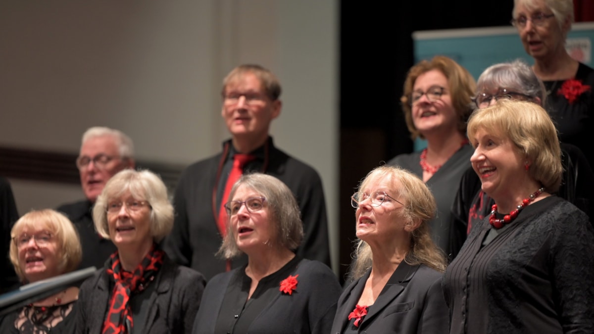 2023 finals: Members of Blackburn People's Choir performing at the 2023 finals of the Choir of The Year contest