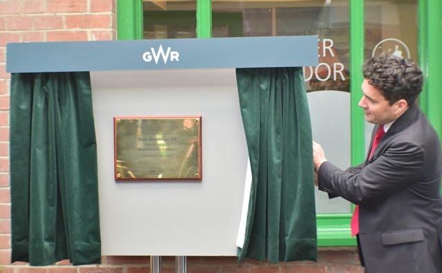 Rail Minister, Huw Merriman MP unveils a plaque to mark the one year anniversary of the Dartmoor Line