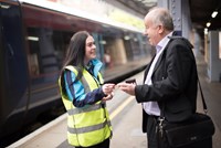 Southeastern achieves significant improvement in passenger satisfaction: Female colleague Emily, Platform staff helping passenger at Tunbridge Wells station