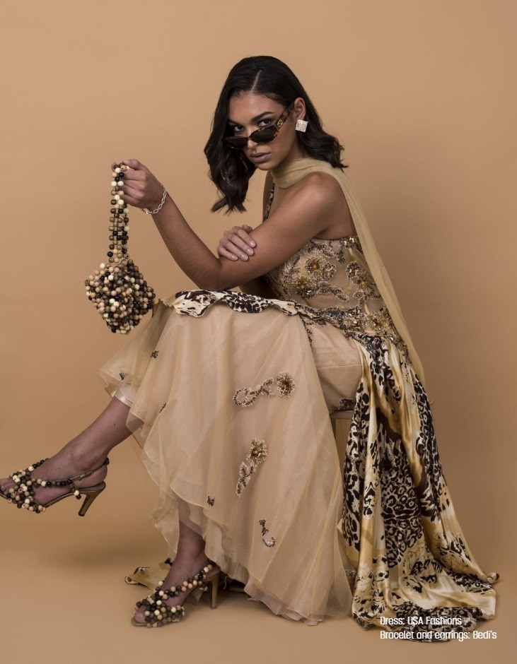 Jordan Mitchell models a dress, bag and jewellery in one of the images from the #FRFV lookbook.
