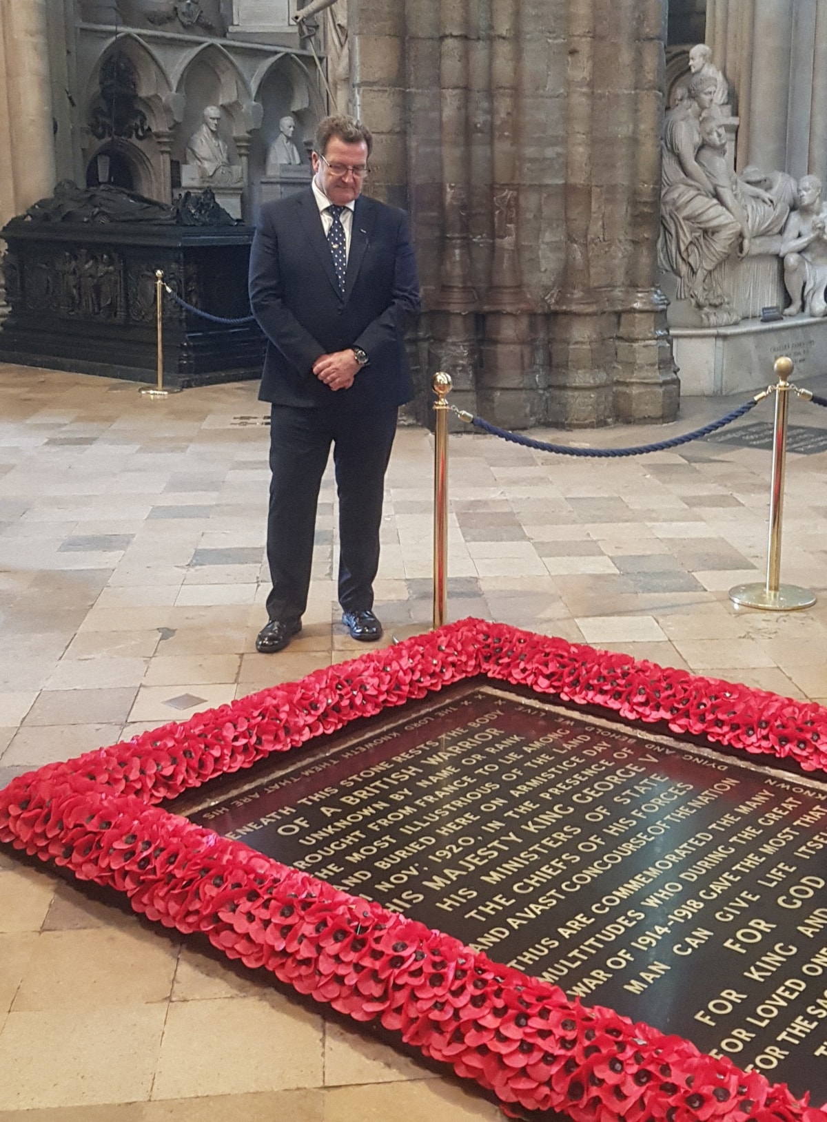 John at the tomb in Westminster Abbey