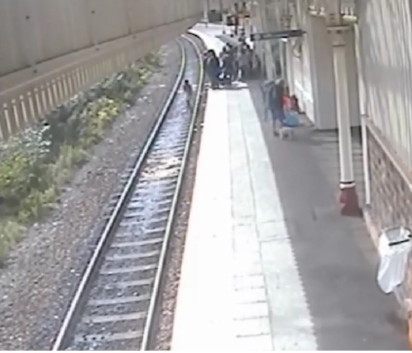 Young person trespassing on the track at Halifax station