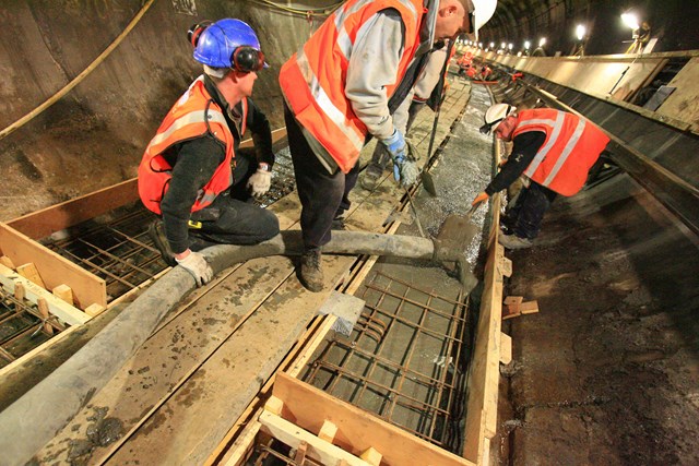 Pouring the concrete into the shuttering: Pouring the concrete into the shuttering