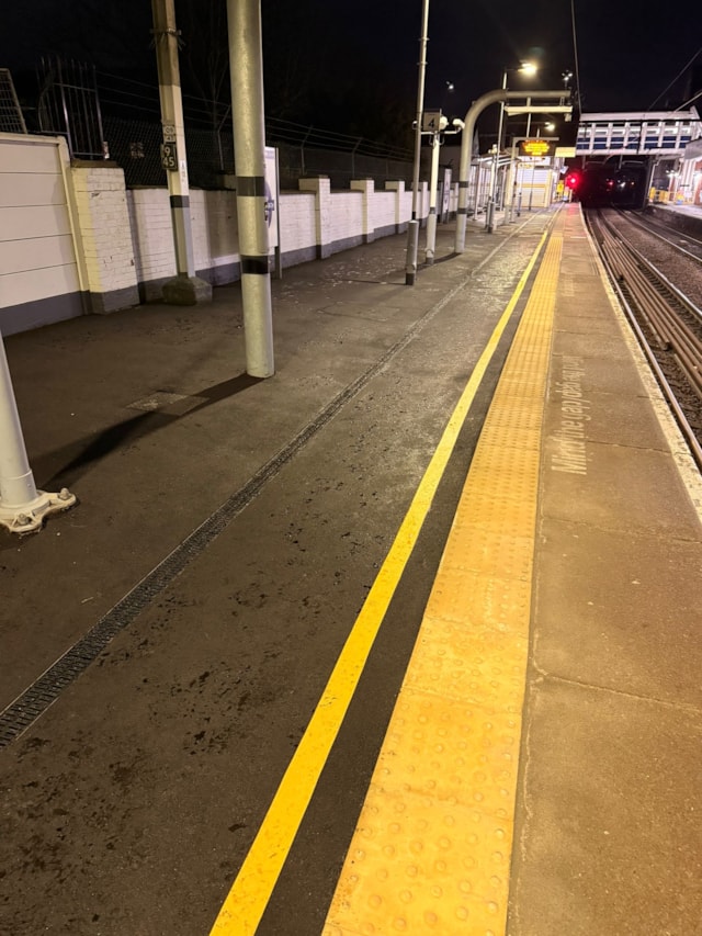 Resurfaced platform at Chadwell Heath with markings reinstated and tactile paving replaced