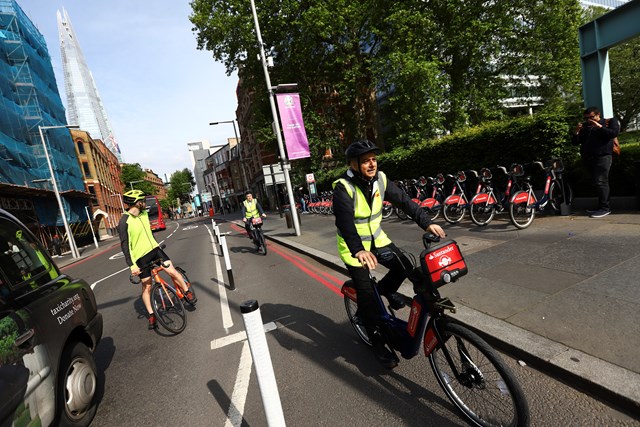 TfL Image - The Mayor of London cycling along the new temporary cycle lane on Tooley Street with Nathan Bostock, Santander UK CEO