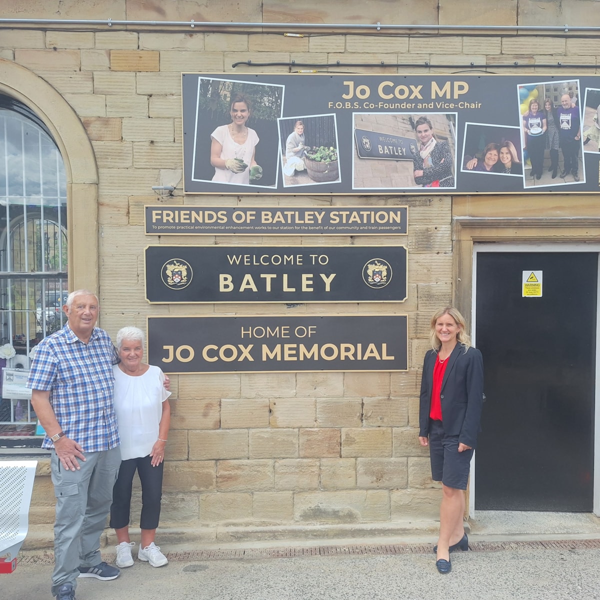 An image of Jo's parents Gordon and Jean and her sister Kim at the new memorial in Batley