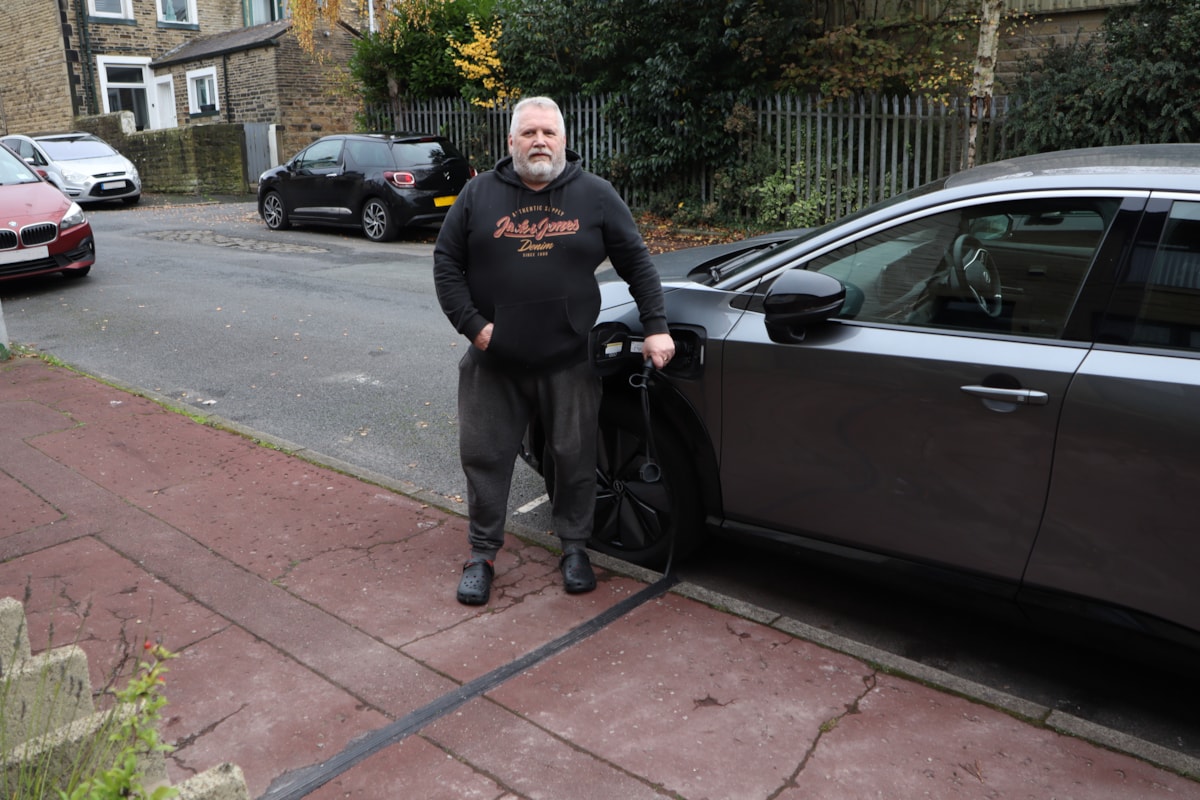 Mike Pickering with the new electric vehicle cross-pavement channel