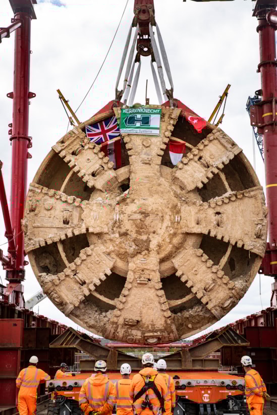TBM Caroline lifted out of vent shaft at Green Park Way, Greenford - May 2025-2: HS2 lifts Tunnel Boring Machine (TBM) ‘Caroline’ from below ground at the Green Park Way site in Greenford, West London.

On Sunday 25th May, engineers working on the HS2 project lifted the TBM 9.48metre diameter cutterhead, front and middle shield, weighing 850 tonnes, using a large gantry crane. The tunnelling machine concluded its 5mile journey from West Ruislip in April, arriving in an underground reception chamber. TBM Caroline excavated over 1.2 million tonnes of earth and installed 4,217 tunnel rings.