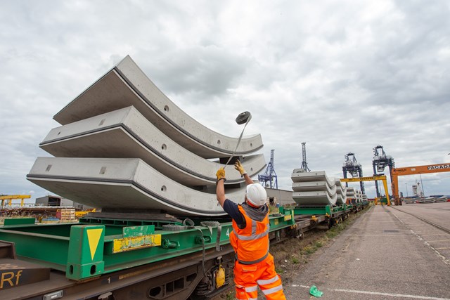 HS2 tunnel segments being strapped down on a GBRf train at Thamesport