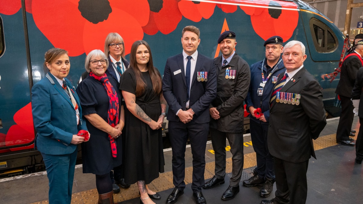 Avanti West Coast colleagues with the Poppy Train at Glasgow Central Station.