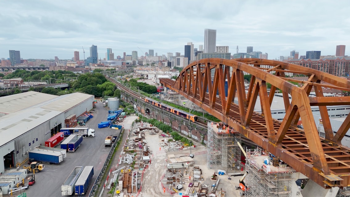 Passengers thanked after major HS2 viaduct installation over Cross City line: Curzon-2-viaduct-over-railway-with-train