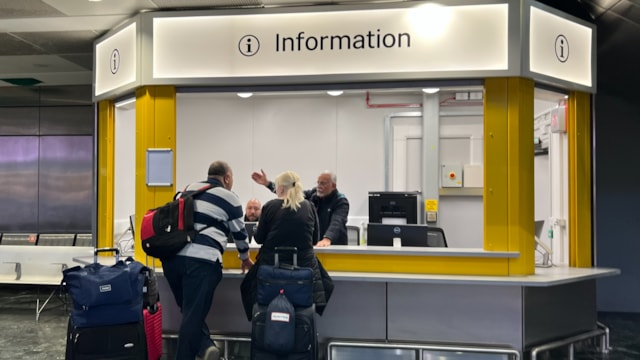 Staff assist customers at London Euston station from the bright new customer hub: Staff assist customers at London Euston station from the bright new customer hub