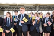 Pupils listen to speeches: Pupils listen to speeches