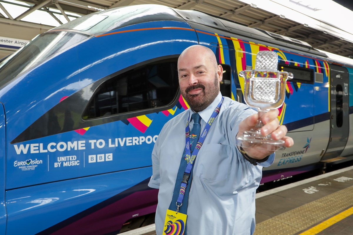 Mark Foster, TPE conductor and Eurovision Superfan with his replica trophy