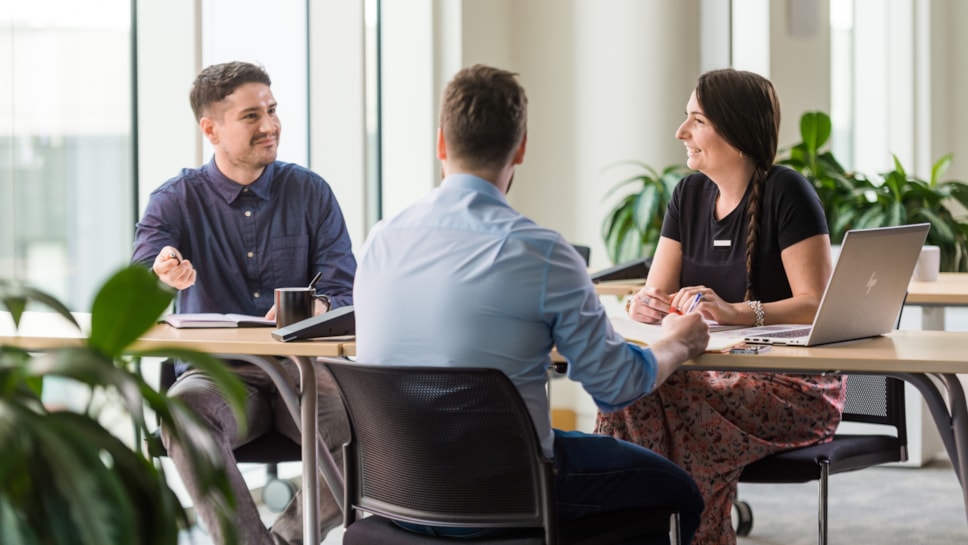 Happy colleagues in meeting