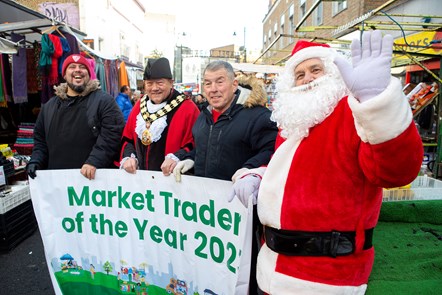 From L-R: Adrian Serrano (Street Food Trader of the Year) Mayor Gary Heather, John Papworth (Market Trader of the Year) and Santa Claus
