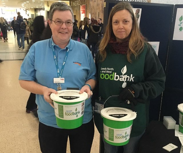 Charity celebrates a year collecting funds at Leeds station: Debbie Ward, Leeds station support assistant and Karen Burgon, project director at Leeds North and West Foodbank-2
