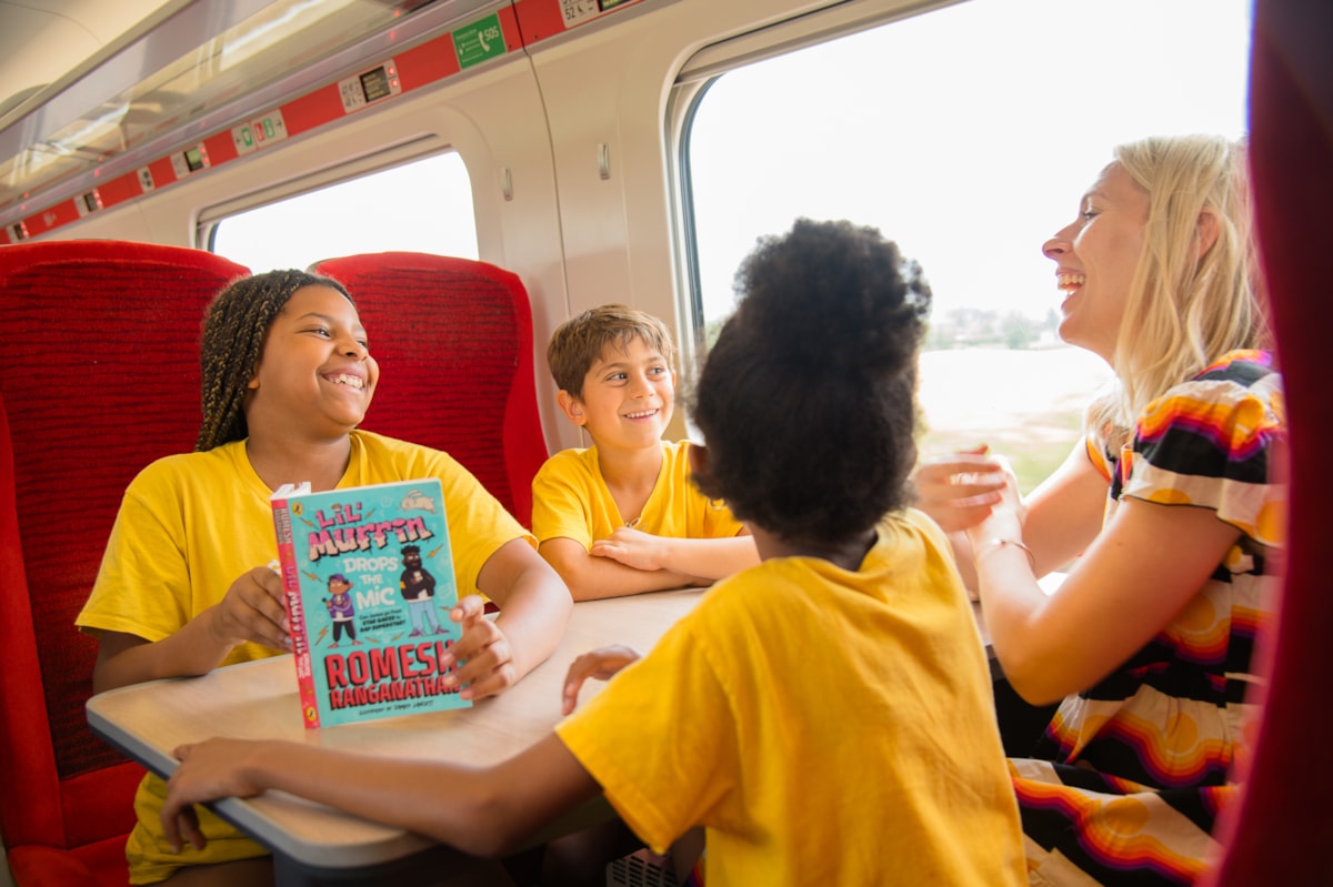 Sara Pascoe with children on LNER Azuma Train