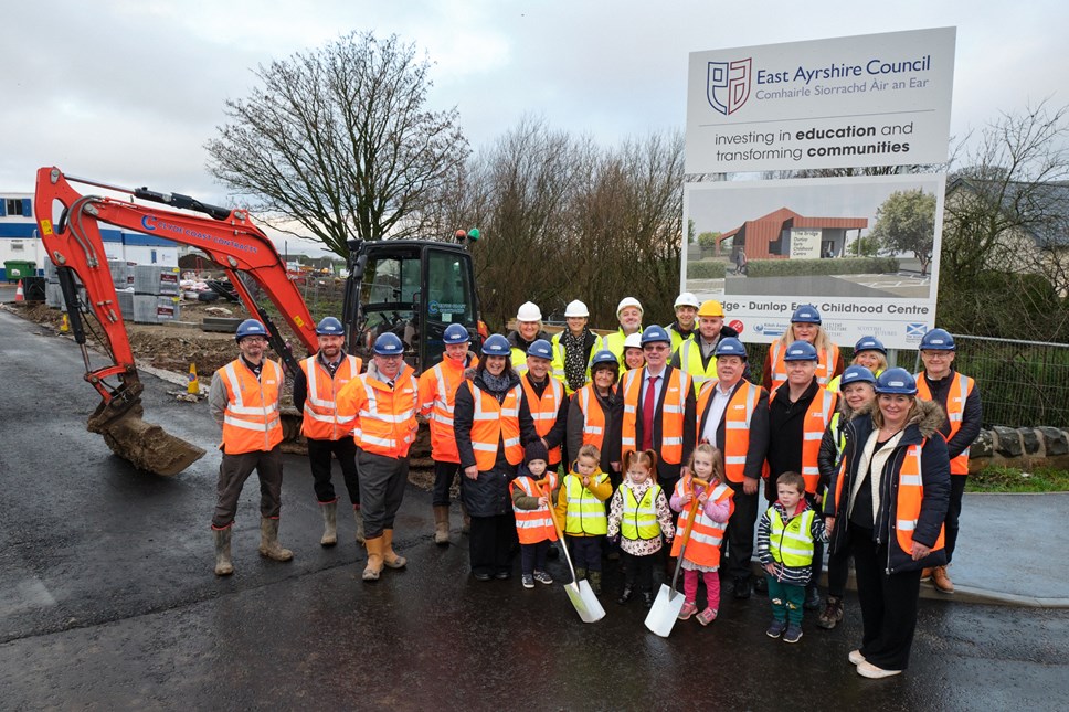 Cllr Reid performs the official ground-breaking with Cllrs McKay, McFadzean, McGhee, Freel and Canning; Head Teacher Mrs Kelly, Depute Head Mrs Nouillan, Linda McAulay-Griffiths, Andrew Kennedy and representatives from Education, Facilities and Property Management and main contractor Ashleigh