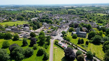 Picture shows an aerial photograph of Fairford high town looking on the High Street and St Mary's Church