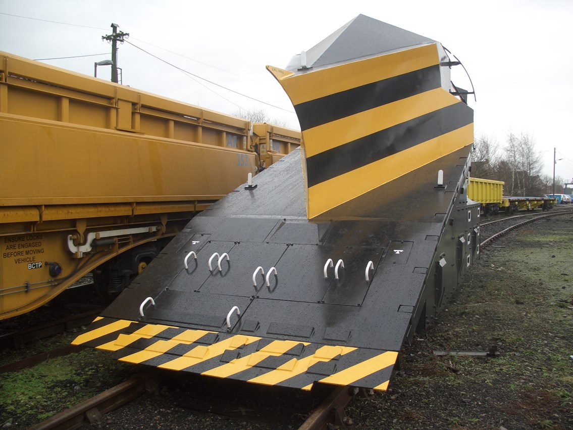 Snowplough at Carlisle depot: This snowplough is used for clearing deep snow and is attached to the front of locomotives. 
winter weather. Snow
