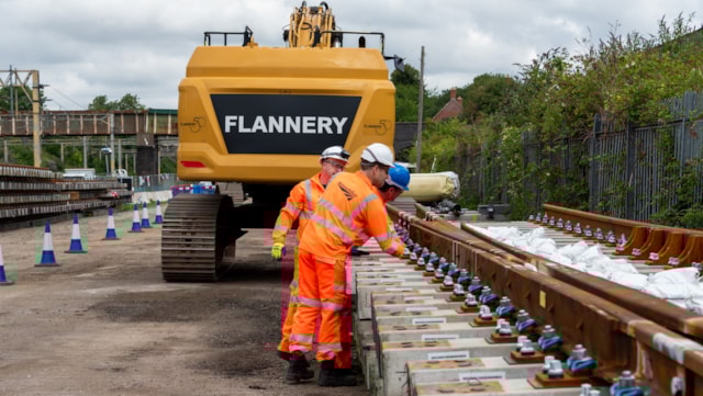 Christmas upgrades to future-proof West Coast Main Line near Milton Keynes: Track workers inspecting panels at Roade ahead of Hanslope Junction renewal this December