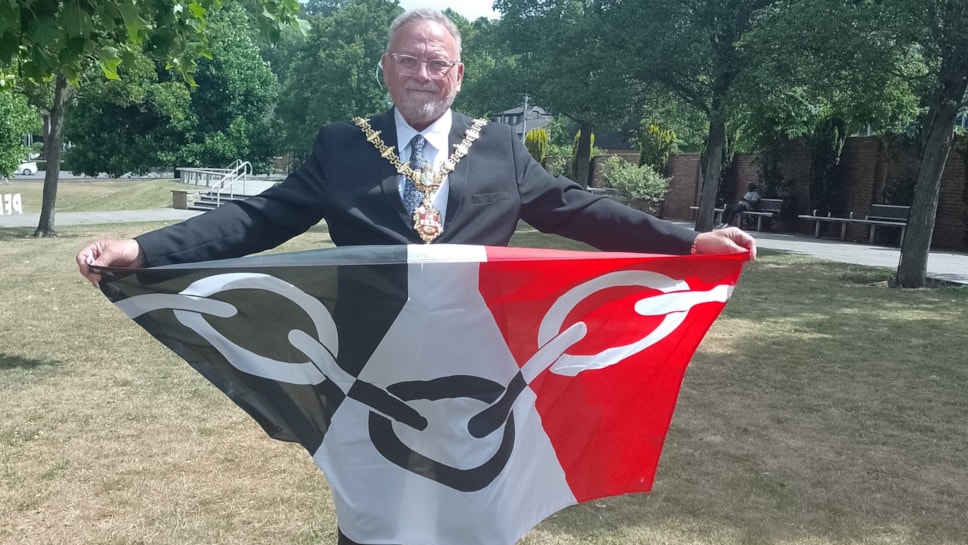 Cllr Pete Lee, the Mayor of Dudley, with the Black Country flag