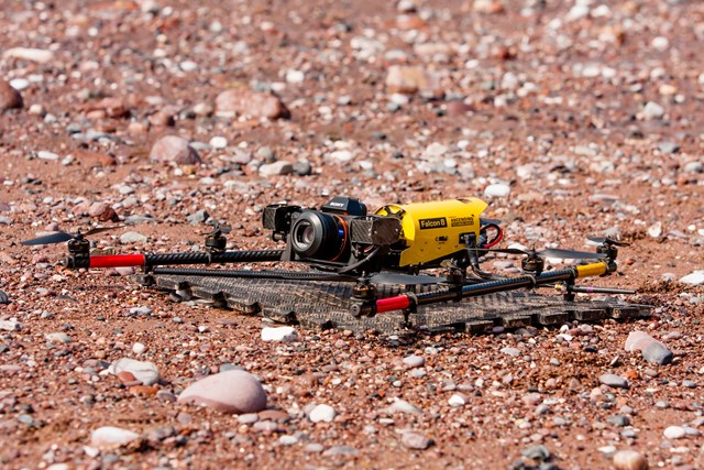 UAV on the floor at Teignmouth: Unmanned Aerial Vehicle (UAV) being launched from a Rigid Inflatable Boat (RIB) at Teignmouth as part of a geological survey to improve the resilience of the railway between Exeter and Newton Abbot