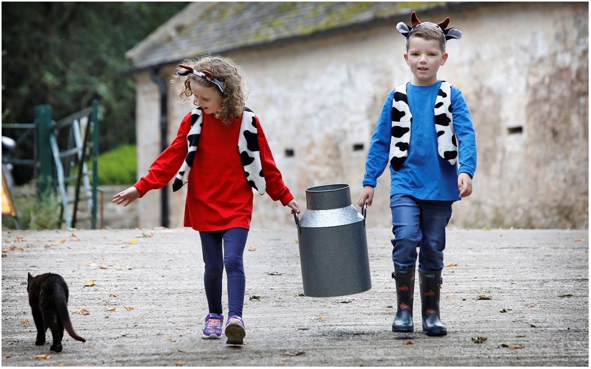 Emily Birrell and Harry Anderson from Mossneuk Primary get ready for MooFest at National Museum of Rural Life in East Kilbride this Saturday 16 and Sunday 17 September.  Supported by Players of People’s Postcode Lottery, the fun family event is a unique celebration of cattle featuring butterchurning workshops, demonstrations, trails, storytelling, crafts and food. Image credit: Paul Dodds.