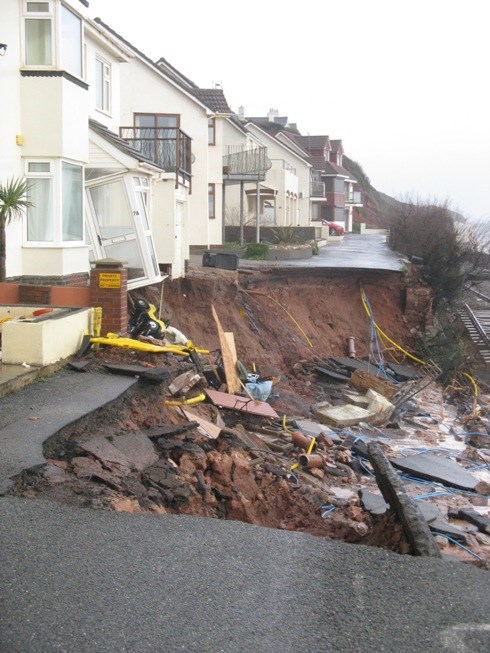 Damage to the railway at Dawlish in Devon: Severe damage to the sea defences and railway at Dawlish in Devon caused by major storms