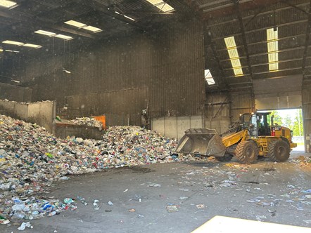 Moray Council staff use heavy machinery to manage recycled plastic waste at Chanonry Recycling Centre, Moycroft Road, in Elgin.