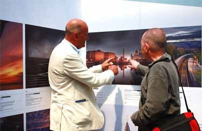 Landscape Photographer of the Year exhibition 2013: Photo of Charlie Waite discussing Gary McGee's image of Saltburn Dock