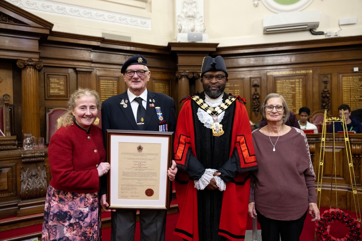 David John Dade receives the Freedom of the Borough with, from left, Cllr Una O'Halloran, Mayor of Islington Cllr Jason Jackson and David's wife Betty.