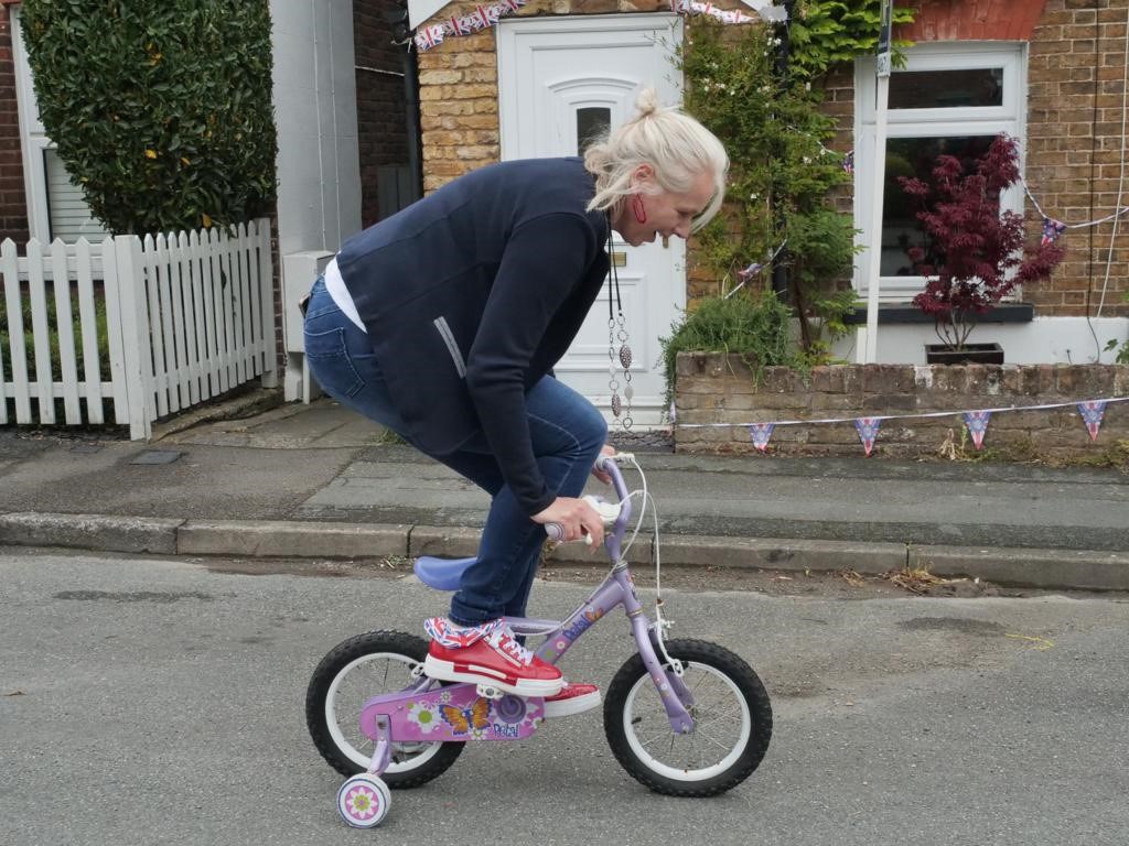 CC Lucy D'Orsi riding a bike-2