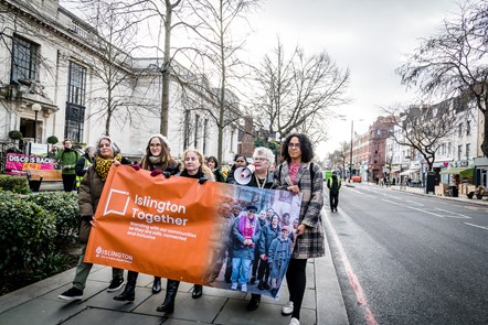 The Islington Together Women's Walk pictured as it makes its way from Islington Town Hall. Holding the Islington Together banner are, from left, Anita Grant, Katharine Crue, Cllr Una O'Halloran, Cllr Sue Lukes and Cllr Kaya Comer-Schwartz.