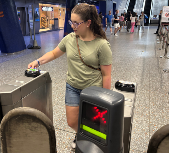 TfL reminds parents and guardians to apply now for Zip Oyster cards ahead of new school year: TfL Image - Passenger with Zip Card