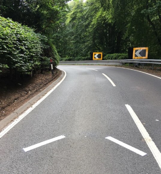 PRIME gateway road marking on the A85 at Bonawe