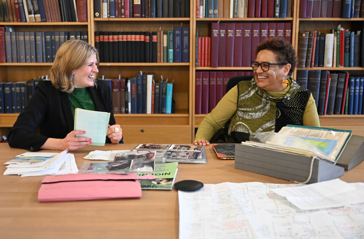 Poet and novelist Jackie Kay at the National Library of Scotland with National Librarian Amina Shah (left). The National Library has acquired Jackie Kay's literary archive for the national collections. Credit: Neil Hanna