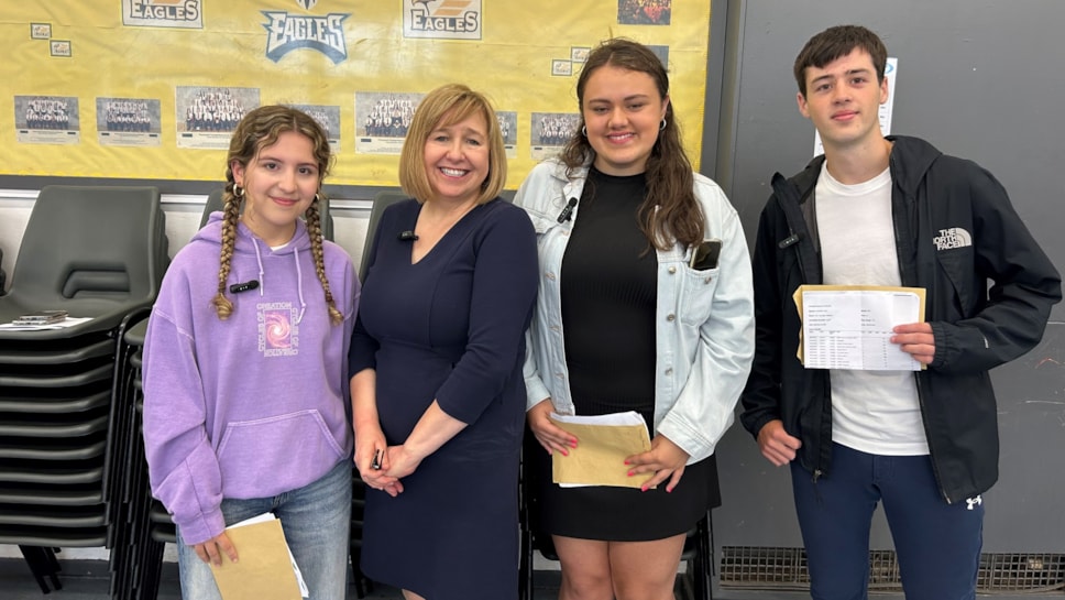 Cabinet Secretary for Education Lynne Neagle with learners at Pencoed Comprehensive, Bridgend receiving their GCSE results