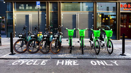 Lime and Human Forest bikes lined up in the hire bay