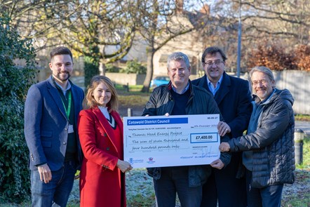 Cllr Joe Harris and Cllr Lisa Spivey presenting Mike McKeown, Jon Cantouris and Nick Cartwright from the Thames Head Energy Project with a pledge for £7,400.